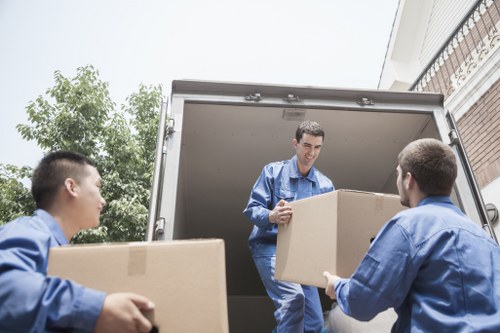 Local removals team preparing a moving van in Maidavale