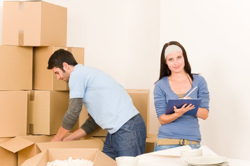 Organized Maidavale business storage unit with labeled boxes and shelves