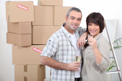 Packed office boxes and labeled equipment ready for Maidavale move