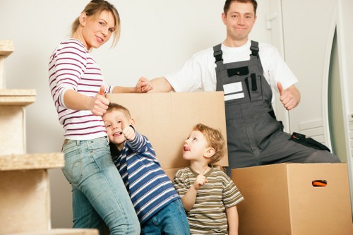 Professional movers handling boxes during a Maidavale move
